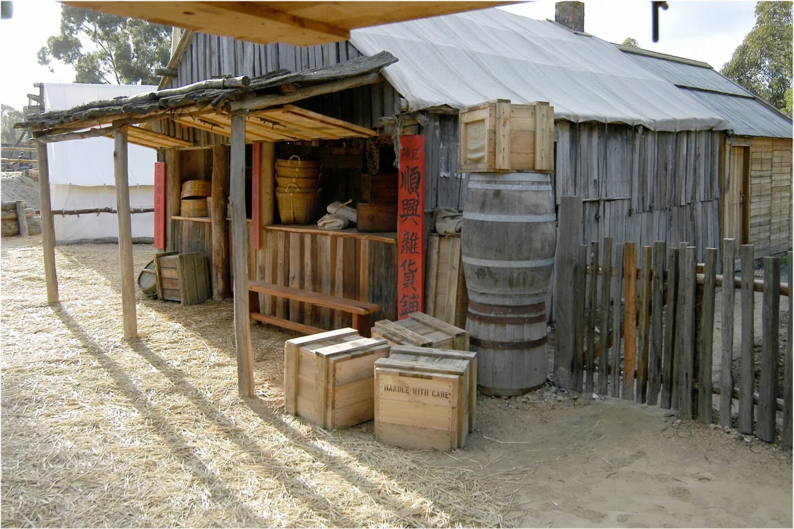 Photograph of a historical shop or store, likely from the 19th or early 20th century, showcasing traditional architecture and business practices.