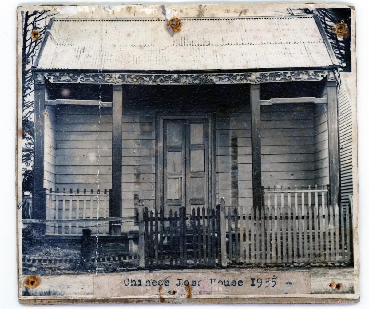 Black and white photograph of a Chinese Joss House from 1955, showcasing traditional Chinese architecture and cultural heritage.