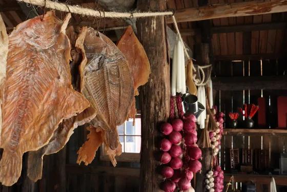 Dried foods and hanging produce displayed inside a reconstructed Chinese goldfields store at Sovereign Hill.
